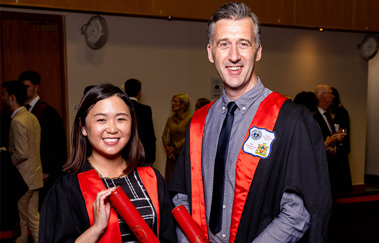 Pictured at the July 2024 Conferring Ceremony (l-r) were Dr Mandy Zhang, Fellowship of the Faculty by Election and Mr Richard Egan, Faculty Board Member.