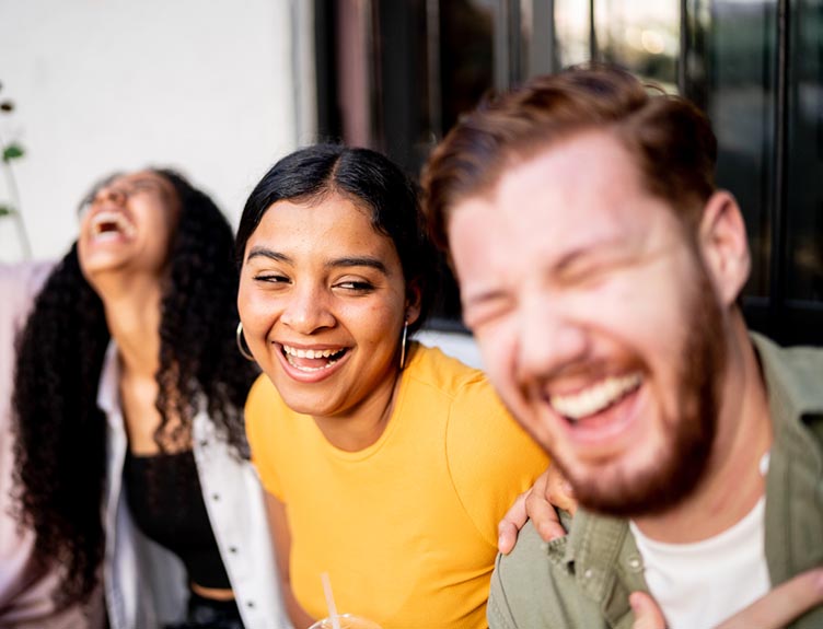 A group of people laughing.