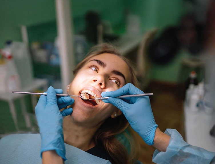 Person getting dental procedure