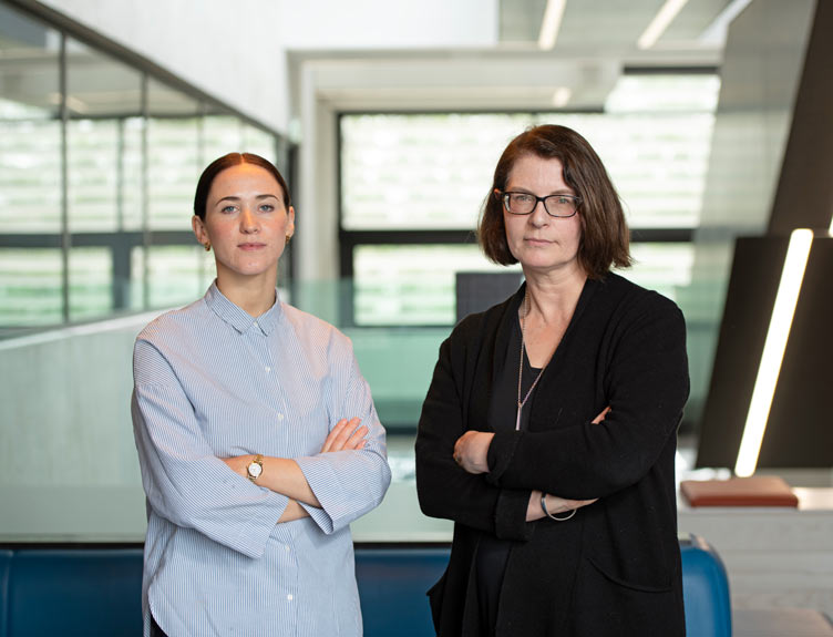 Two medical researchers pictured in university building