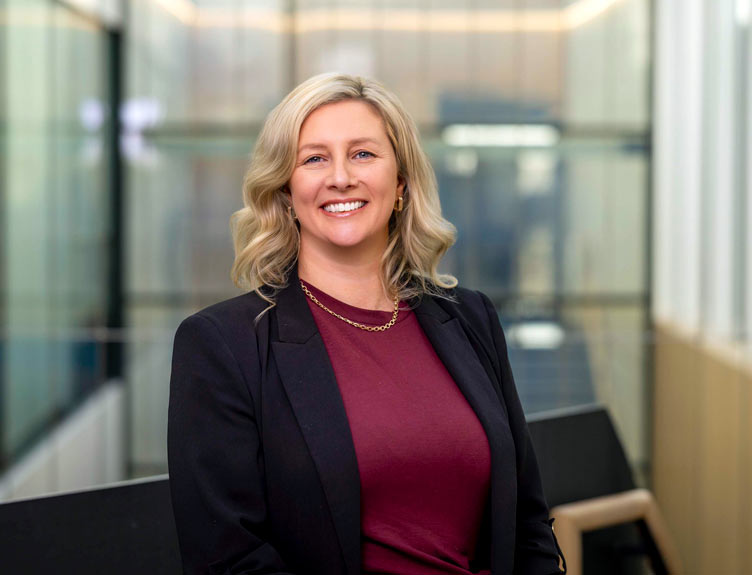 Head and shoulders photo of Caroline Curtin in a university