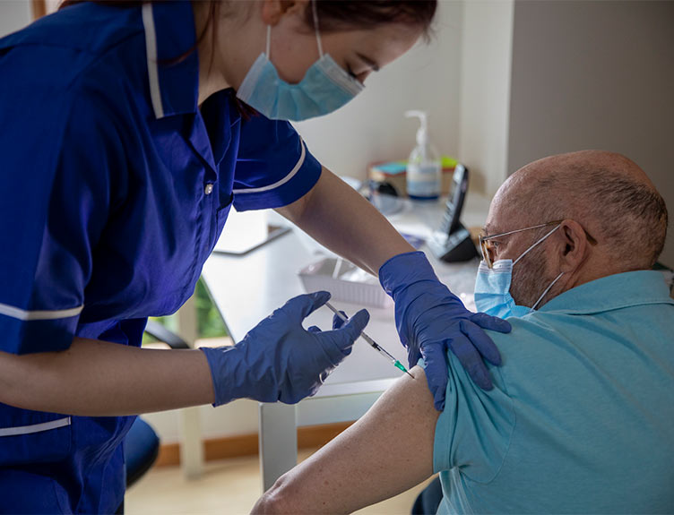 Person receiving vaccination