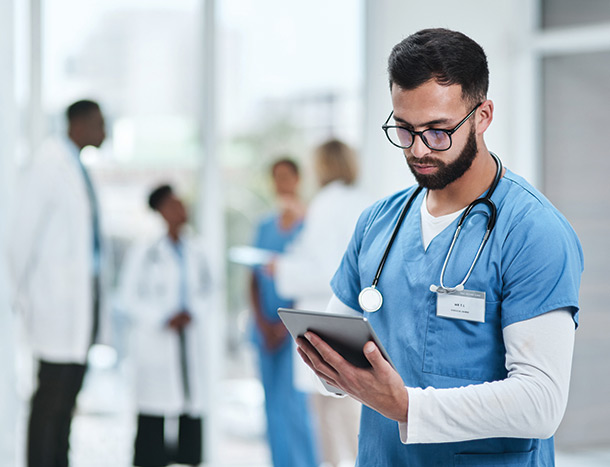 Doctor looking at tablet
