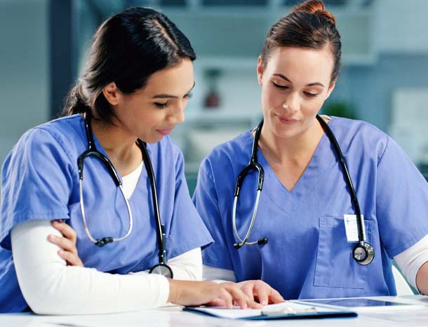 Two nurses in discussion