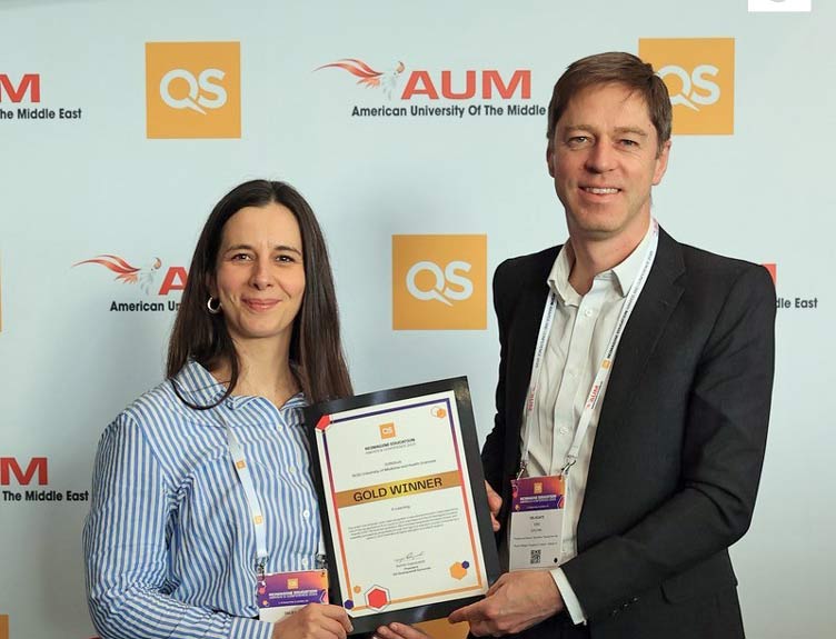 Two winners of global award celebrate their win