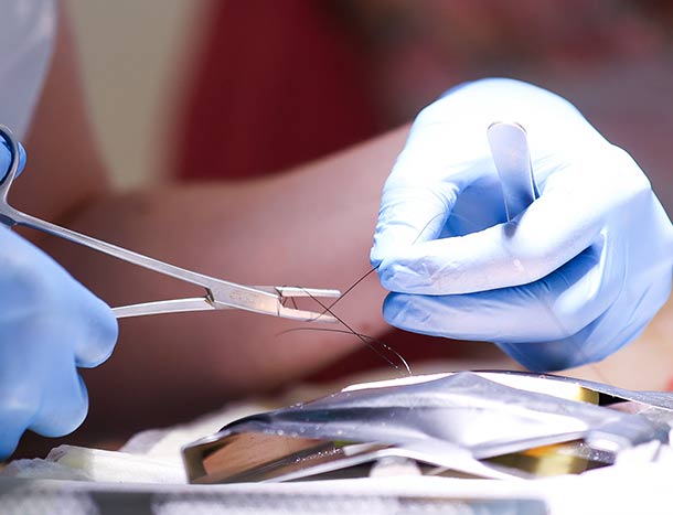 Suturing during surgical bootcamp