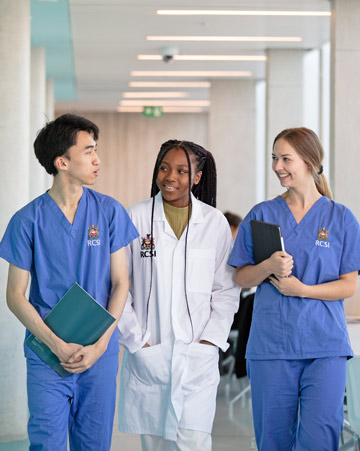 Student doctors in a university hallway