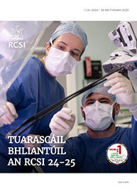 Cover of RCSI 24/25 annual report, in Irish, shows two young surgeons performing a procedure