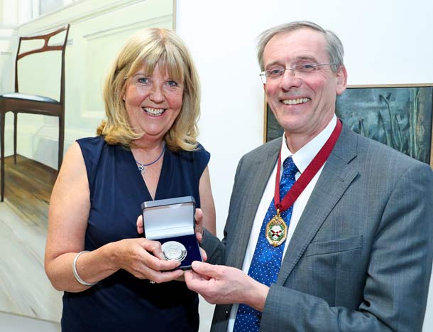 Mary Kelly poses for a photo