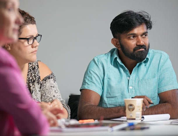Healthcare professional listens during talk