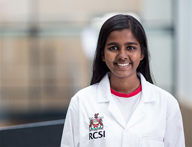 Undergraduate student in white coat