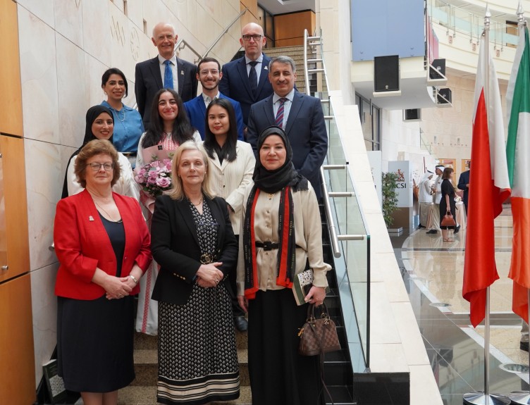 Four volunteering students with Executive members of RCSI in Dublin and Bahrain