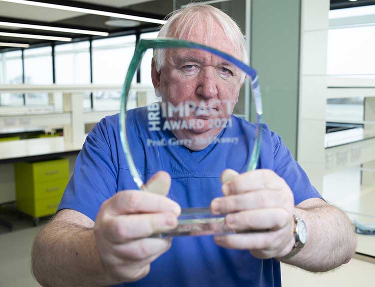 Professor Gerry McElvaney pictured with the HRB Impact Award 2021 Gerry McElvaney with HRB Impact Award