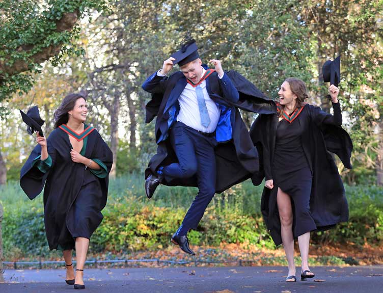 Graduates conferring RCSI graduates jump for joy