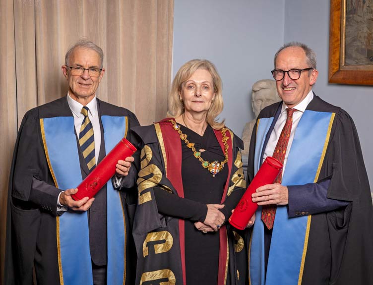 Millin Meeting 2023 Three healthcare professionals in gowns