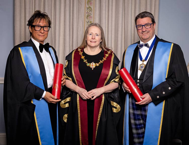 Honorary Fellowships Three people celebrate receiving fellowships