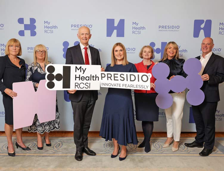 MyHealth RCSI launch Large group hold up signage at event launch