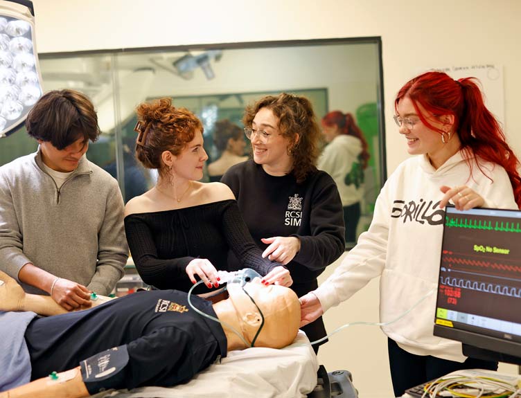 Open Day 2025 Four young students explore mannequin at a university open day