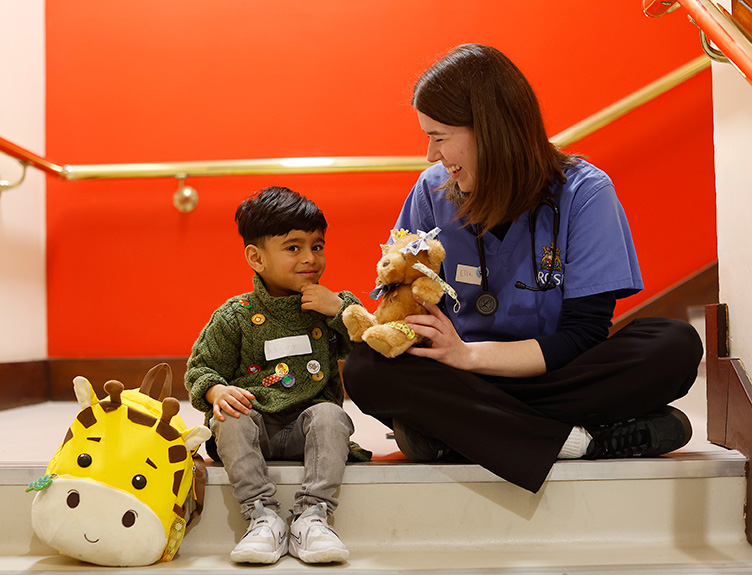 Teddy Bear Hospital 2025 Adyant Chawan, age 3, from Sandyford with his teddy, and RCSI student Ellie Smith at RCSI’s Teddy Bear Hospital 2025.