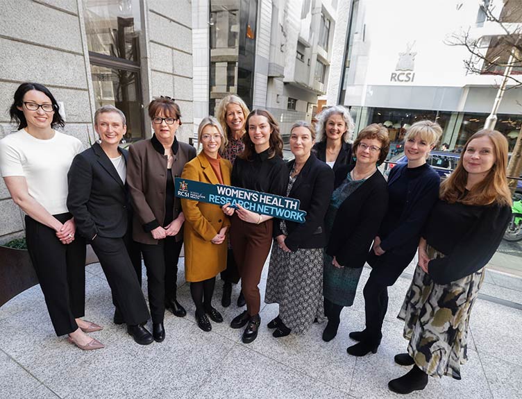 Women Health Research Large group stand in a row on city street