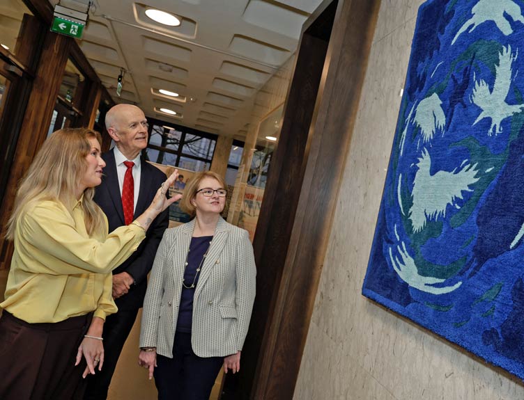 Artist displays artwork in educational walkway
