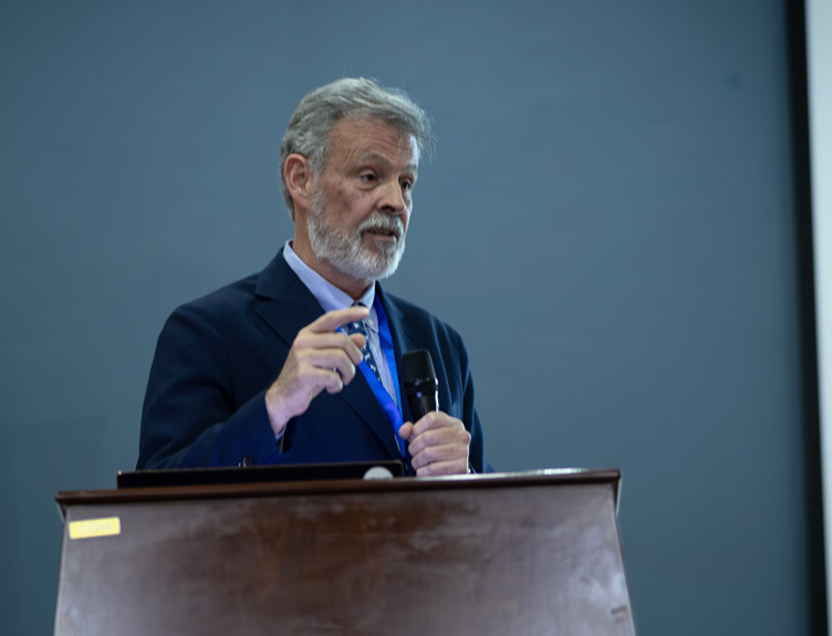 Juan Carlos Puyana Man speaks during conference