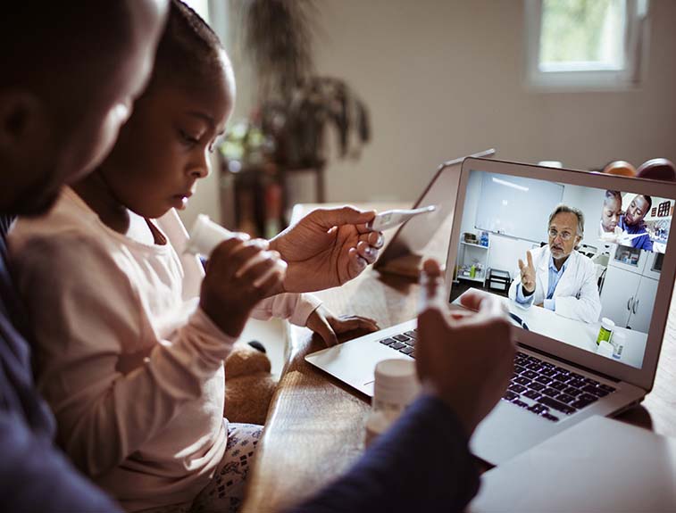Paediatric telemedicine Paediatric telemedicine stock photo