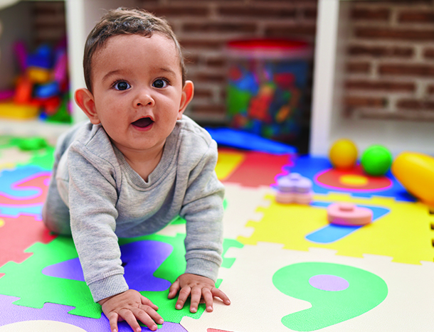 Baby on playmat