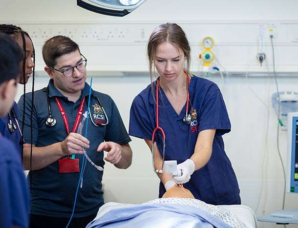 RCSI Undergraduate Medicine student practices intubating in the SIM lab