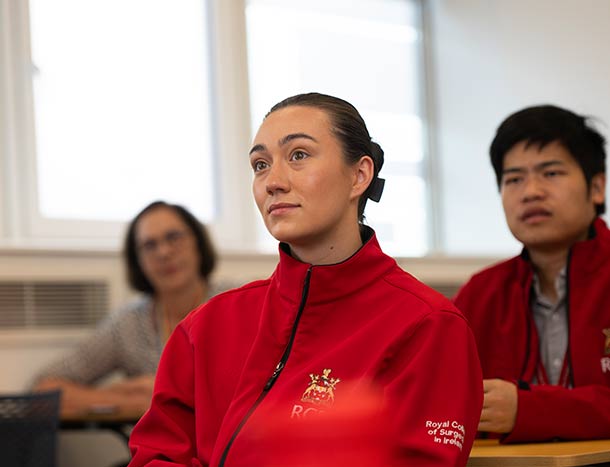 Posgraduate student listens to lecture