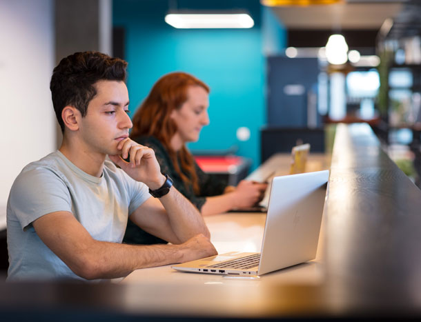RCSI student on computer in Beaumont