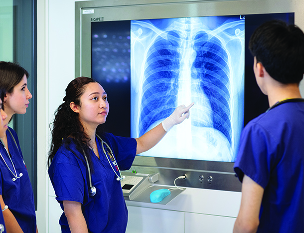 Students and tutor with xray