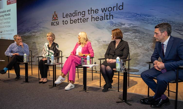 Five panel speakers in discussion