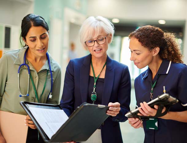Three medical colleagues collaborate