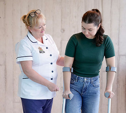 Nurse and patient with crutches