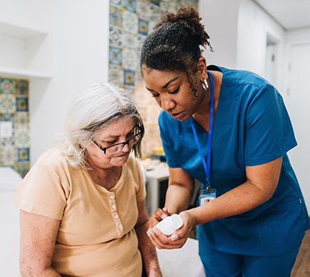 A nurse explaining a product to a patient.
