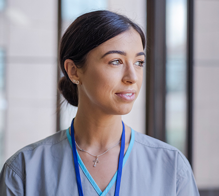 Headshot of a young medical professional.