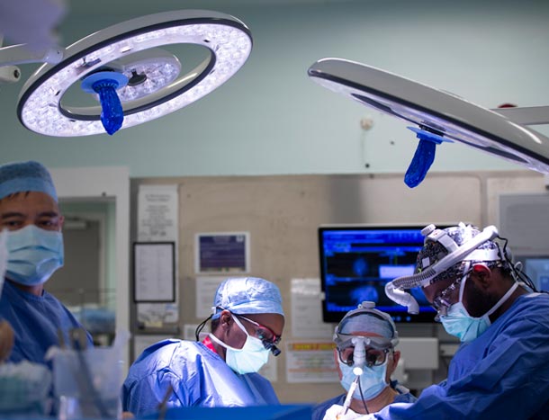 Donncha O Brien  and surgical team performing neurosurgery