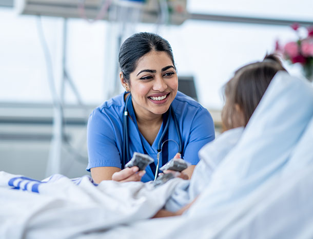 Doctor checking on young patient